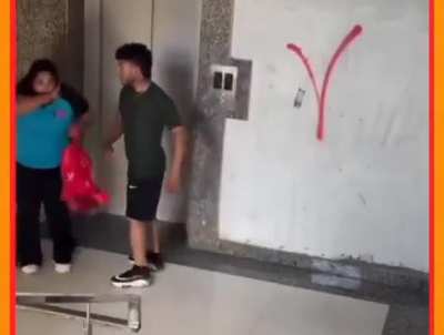 In the elevator, the boy accidentally touched the madam, and then she kept humiliating him continuously before slapping him. The boy then beat her up even more, but if there wasn't CCTV, the madam would have played the victim card.