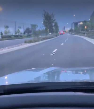 WCGW skater casually skitching at the back of a truck