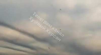 Incoming Ukrainian HIMARS missiles are exploding in the background while Russian air defense is firing. 09/02/2022 Kherson Oblast