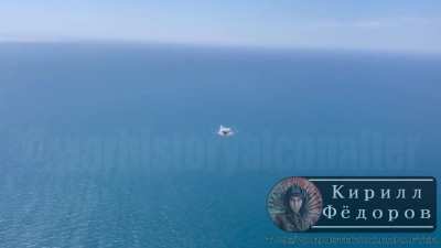 Russian Su-24 drops parachute bombs on Ukrainian sea drone 