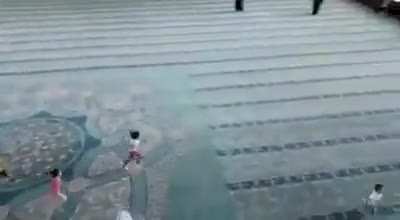 The kids visit the mosque