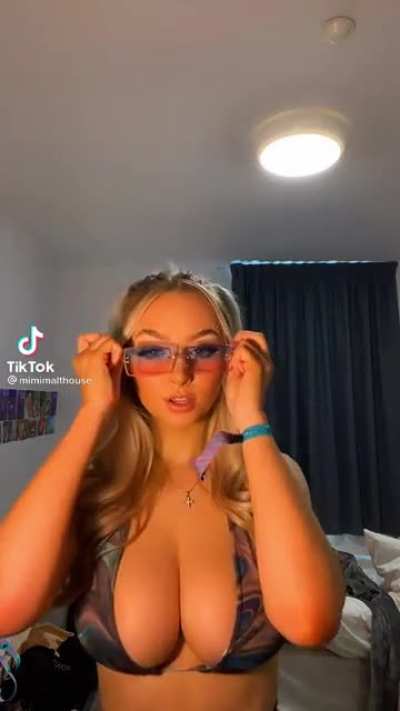 Square glasses, big round tits