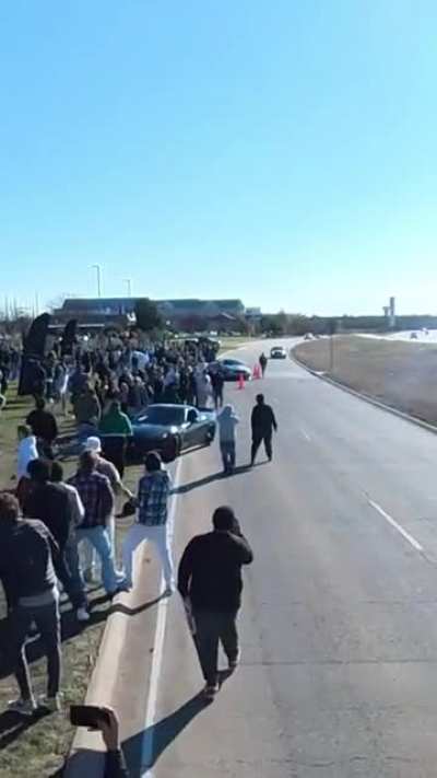 WCGW Standing next to a road as cars are leaving a car meet