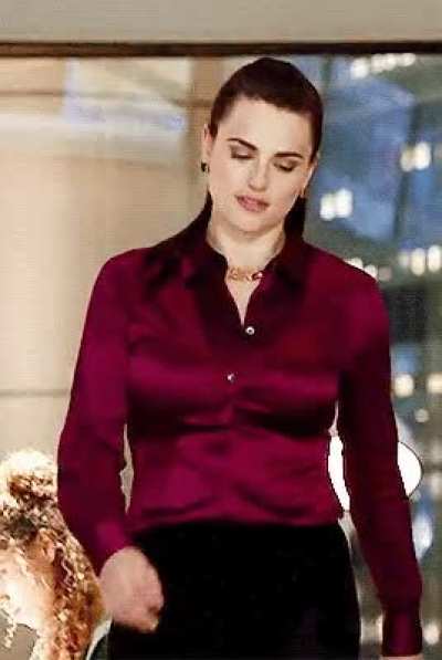 Those buttons are working overtime to keep Katie McGrath’s tits from popping out