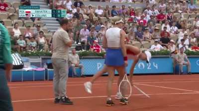 Paris Olympics 2024 QF: Iga Świątek getting hit by the ball during a point against Danielle Collins