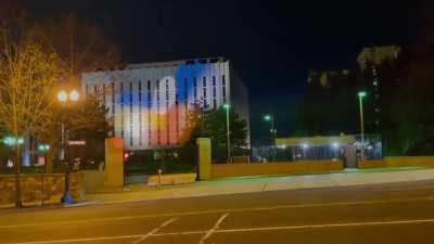 Someone projected the Ukrainian flag on Russian Embassy in DC. The Russians tried - and failed - to drown out the projection.
