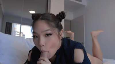 Cute asian girl sucking a cock
