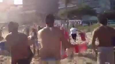 Cops trying to take people out of the beach in Rio