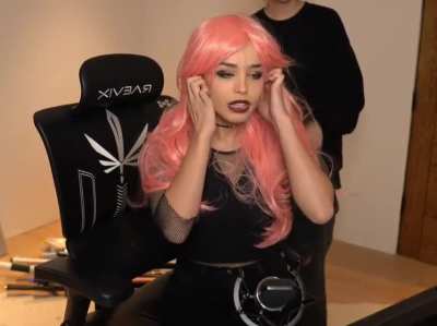 Rae with short and pink hair