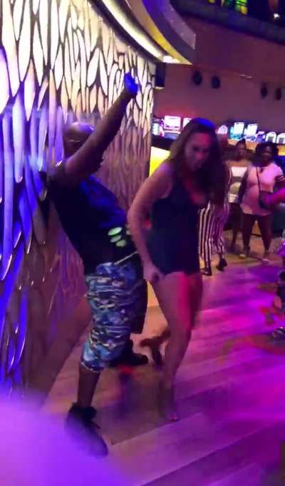 Wife dancing with black man in front of white hubby 