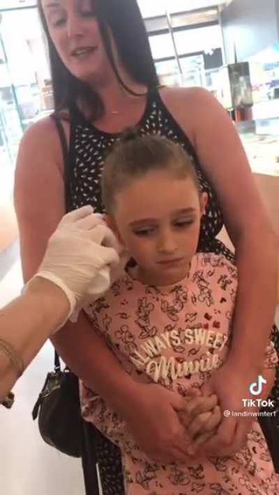 Ear piercing doesn’t go as planned… she was fine and got icecream afterwards