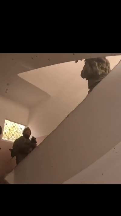 IDF infantry in a firefight over a staircase, utilizing frag grenades