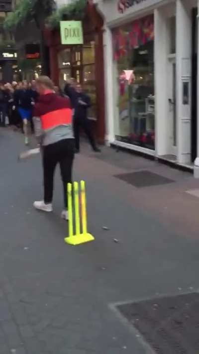 Joe Root bowling Ben Stokes out in the streets of London. Incredible send off