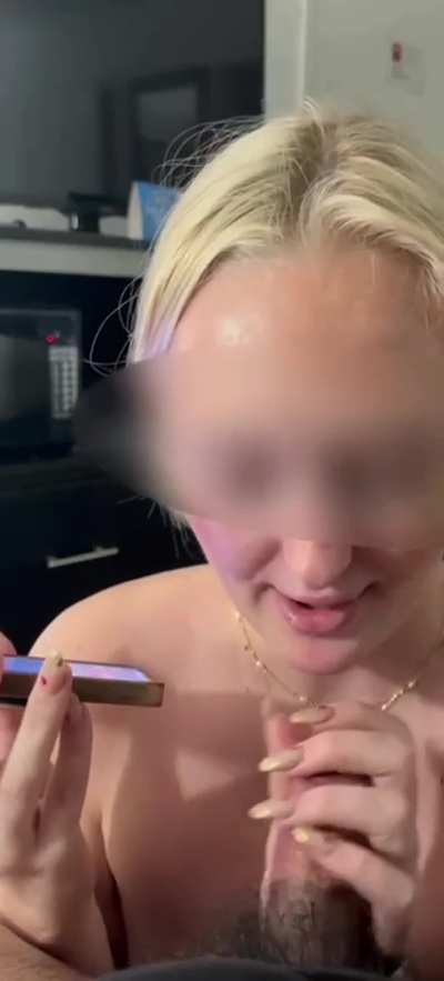 White Girl talking on phone with bf while sucking Brown cock