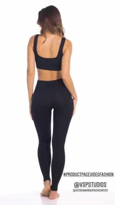 Beauty in a black, sportive, outfit