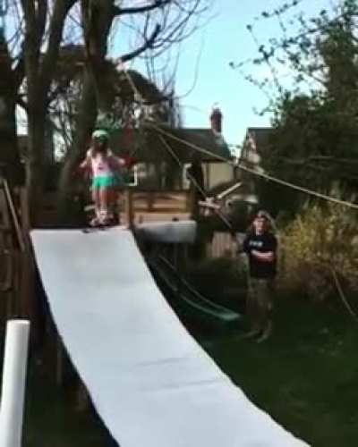 Building a miniature backyard ski lift and ski slope