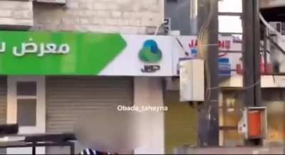 Red crescent (red cross) Palestinian medic taking active part in battle