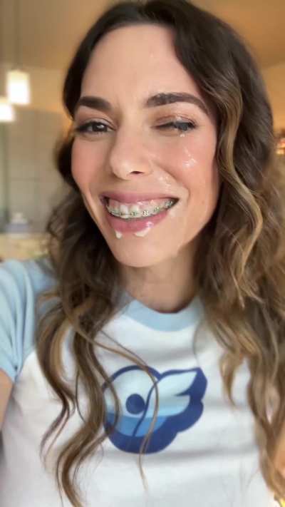 Striking a sexy pose as cum drips off my face