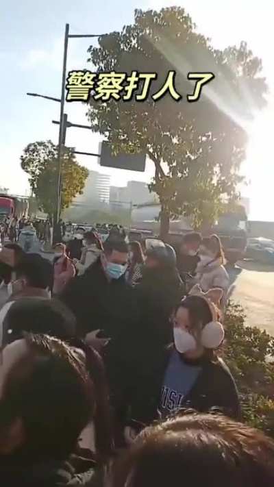 Alltech Medical Systems' Hangzhou factory workers protesting and being beaten by police over poor wages and layoffs situation