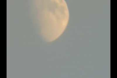 OKAY, so I pulled out a 40x zoom cam l had lying around. I was PLAYING AROUND zooming in and out on the moon (a lot of shake) but check out min 1.13!