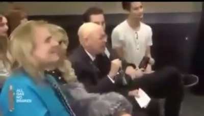 The guy in the brown suit..