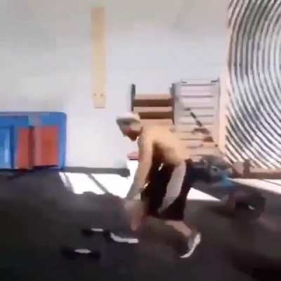 Doing a backflip with different type of dumbbells