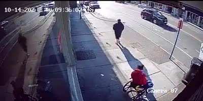 POS smacks a man in a wheelchair with a bike lock for no reason