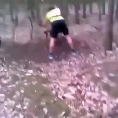 Cyclist frees a mountain goat that got its horns trapped around a tree