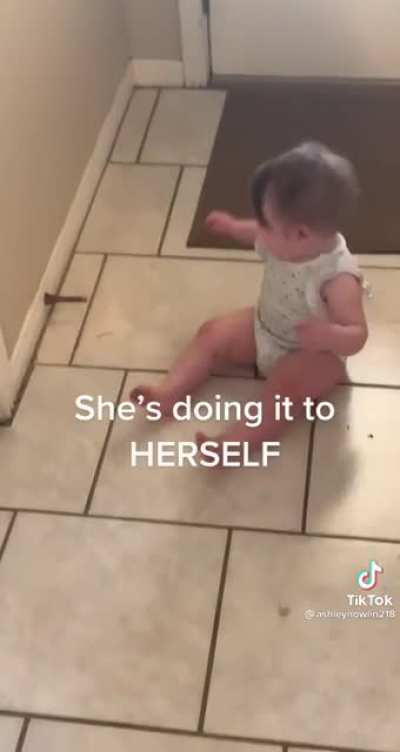 She's doing it to herself.