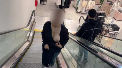 Flashing my boobs at H&M escalator