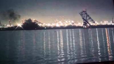 A cargo ship hit the Francis Scott Key Bridge in Baltimore, causing it the collapse. Multiple cars reportedly plunged into the water below. #FrancisScottKeyBridge #Baltimore