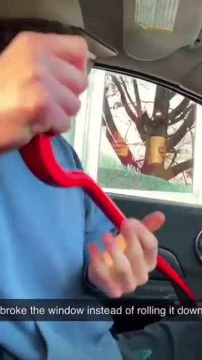 Breaking a car window for tik tok points