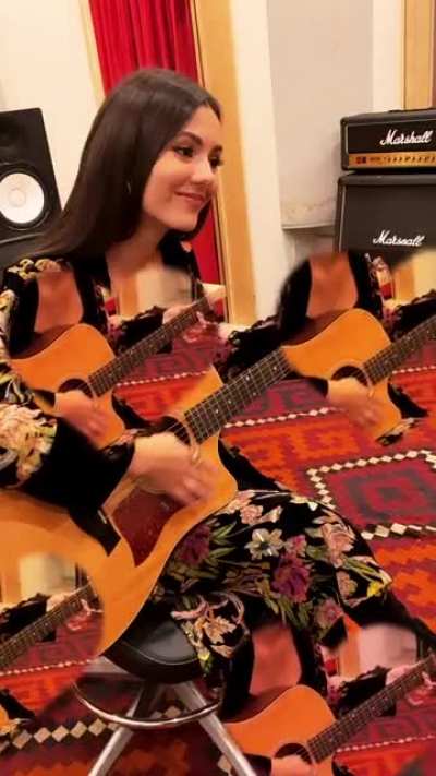 Playing guitar