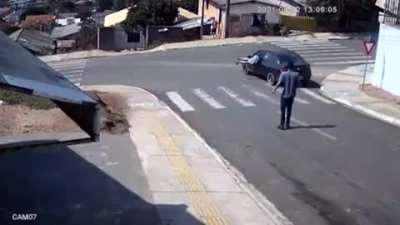 Guy jumps through window of moving car and saves it from crashing