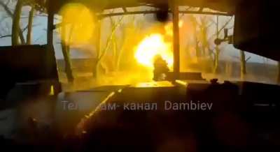 Russian tank hits kamikaze drone in the middle of air 