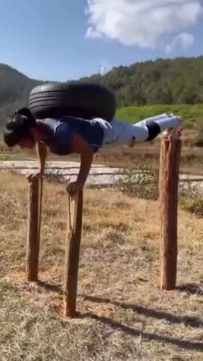 Impressive work-out using a piece of wood.
