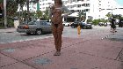 Risky flashing on the street corner!