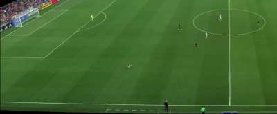 Kid runs on football pitch. Mom takes him down and carries him back.