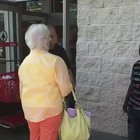 Old lady harasses a young kid for selling candy