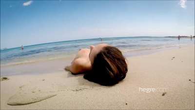 Alisa naked on a public beach