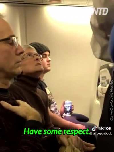 Karen escorted off plane by police for harassing nearby passenger