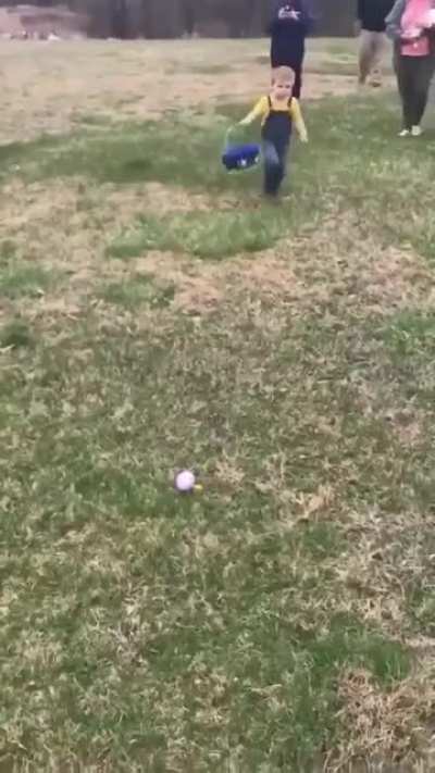 Just a kid collecting Easter eggs