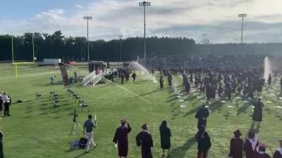 The sprinklers came on at my sisters graduation ceremony.