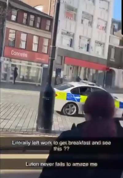 Stealing a police car and mooning out the window
