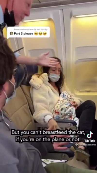 Women breastfeeding cat? This can’t be real wtf