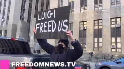 Person outside the NY Criminal Court: “The real terrorism is these corporations that are keeping us poor and sick and confused
