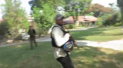 Footage obtained from cameras and GoPros that were found on the bodies of Hamas and Palestinian Islamic Jihad terrorists who assaulted Kfar Aza