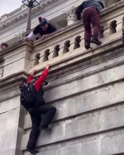 Trying to climb up a wall when you're not tom cruise