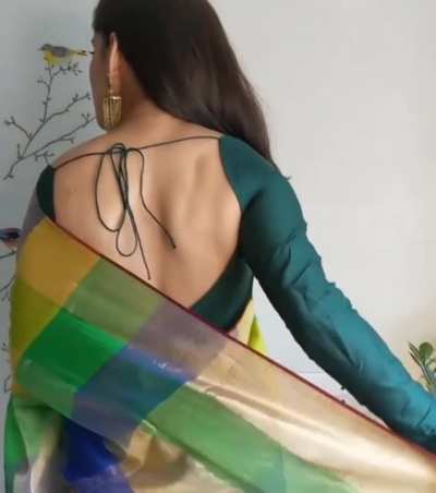 Voluptuous Babe Priya Bapat flaunting her sexy back. Milky back with a golden tint. What more do her worshippers want? Forced me to put this on sub. Back with a bang.