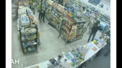 Armed robber taken down by thieves